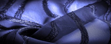 Doku arkaplan resmi, kumaş şeffaf koyu mavi, parlak doğuştan gelen çizgilerle, ışığın içinden geçmesine izin veren madde, böylece nesneler açıkça görülebilir..