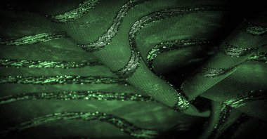 Doku arkaplan resmi. Kumaş şeffaf zümrüt yeşili. Parlak doğuştan gelen çizgileri var..