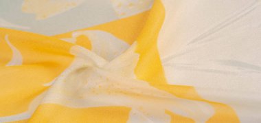 Doku, arka plan, desen, ipek kumaş, gri bir arka plan üzerinde sarı çiçekler. Projektörler, pastel renklerde bu hassas kumaş güverte ve fanteziler neden olacak pasifize olacak