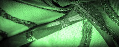 Doku arkaplan resmi. Kumaş şeffaf zümrüt yeşili. Parlak doğuştan gelen çizgileri var..