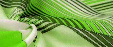 Doku, arkaplan, desen, ipek kumaş, kahverengi renk, geometrik çizgiler, farklı tonlardaki kabile düz çizgileri, geometrik desen, projeleriniz için ayarlanmış, yeşil ve beyaz.