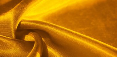Doku, arkaplan, desen, sarılı ipek kumaş. Bu sevimli, yumuşak ve parlak kumaşın pürüzsüz bir vizon yüzeyi var. Projelerinizi yaratmak için mükemmel..