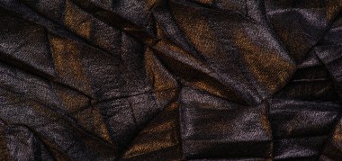 Doku. Geçmişi. şablon. Duvar kağıdı. Sarı altın çizgili siyah ipek kumaş, kırışık kumaş.