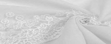 Doku, arkaplan, desen, kartpostal, ipek kumaş, dantel ambalajlı kadın beyaz atkısı. Yazdırma ve dijital materyallerinizi oluşturmak için bu süslü resimleri kullanın.