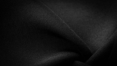 Doku, arkaplan, desen, saten siyah genellikle parlak bir yüzeye ve donuk bir sırta sahip, saten dokuma dört ya da daha fazla dolgu ipliği ile karakterize edilir.,