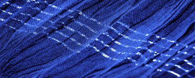 Arkaplan resminin dokusu, dekorun süsü, safir mavi kıvrımlı kumaş, paralel veya çapraz kıvrımlı tırtıklı kumaş; böyle bir kumaştan elde edilen ürünler..