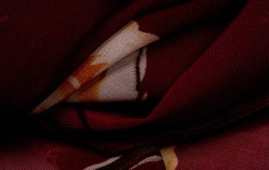 Doku, arka plan, pembe çiçekli bordo kumaş. Projeleriniz stüdyomuzda son ürünlerini kullanma konusunda derin bilgiye sahip tasarımcılar tarafından geliştirildi..