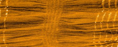 Arkaplan deseninin dokusu, süs süsü, altın sarısı kıvrımlı kumaş, paralel ya da çapraz kıvrımlı kumaş; böyle bir kumaştan çıkan ürünler.