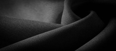 Doku, arkaplan, desen, saten siyah genellikle parlak bir yüzeye ve donuk bir sırta sahip, saten dokuma dört ya da daha fazla dolgu ipliği ile karakterize edilir.,