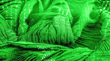 Arkaplan dokusu, süs süsü, zümrüt yeşili kıvrımlı kumaş, paralel veya çapraz kıvrımlı kumaş; böyle bir kumaştan çıkan ürünler..