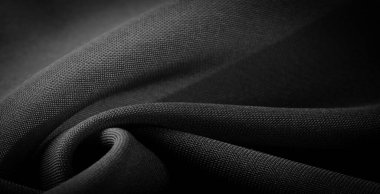 Doku, arkaplan, desen, saten siyah genellikle parlak bir yüzeye ve donuk bir sırta sahip, saten dokuma dört ya da daha fazla dolgu ipliği ile karakterize edilir.,