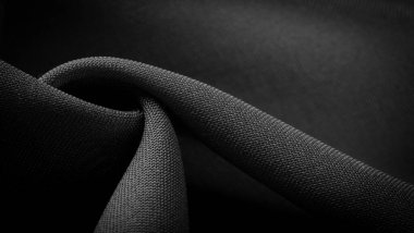 Doku, arkaplan, desen, saten siyah genellikle parlak bir yüzeye ve donuk bir sırta sahip, saten dokuma dört ya da daha fazla dolgu ipliği ile karakterize edilir.,