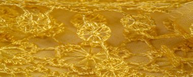 Doku, arkaplan, desen, kartpostal, ipek kumaş, dantel ambalajlı kadın sarı atkısı. Yazdırma ve dijital materyallerinizi oluşturmak için bu süslü resimleri kullanın.