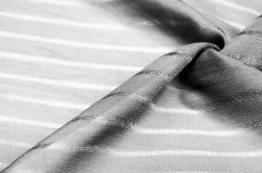 Doku, arkaplan, desen, çizgileri olan basit gri kumaş. İpliğin çıkarılması ile oluşan çizgiler,