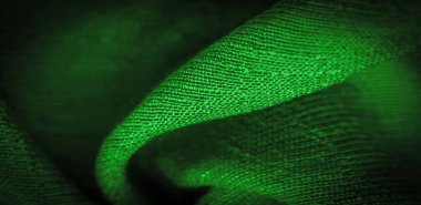 Duvar kağıdının dokusu, süs süsü, yeşil sentlik koyu zümrüt ipeği kumaşı, dekoratif elementler ekleyerek daha çekici hale getirebilirsiniz.