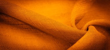 Arkaplan resminin dokusu, süsün dekoru, sarı sentlik ipek kumaşın sıcak rengi, dekoratif elementler ekleyerek bir şeyi daha çekici hale getirebilirsiniz.