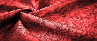 relief pattern, composite textiles, red silk fabric, with a floral pattern, unusually pleasant visual sensations: slippery, coolness, softness; beautiful appearance, unique luster;