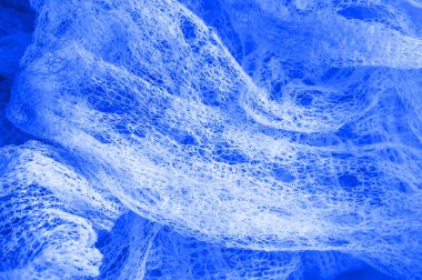 Doku arka planı, desen. Mavi kumaş örgü içinde, tasarımınız için çok güzel dekoratif bir kumaş. Duvar kağıdı, tasarım ve daha fazlası için kullanılabilir. Maviyi seviyorsan, bu kumaşı seveceksin.