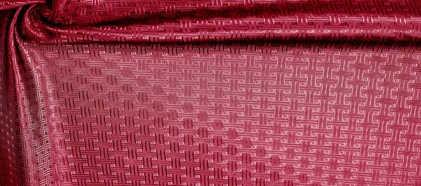 Background texture, pattern. Red silk fabric with a small checkered pattern. A classic look, add this to your designer collection. If you are looking for a red runway, you can learn how to go.