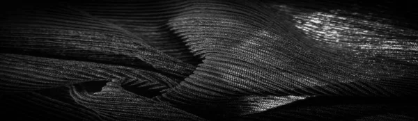 褶皱黑色 是一种丝绸 羊毛或合成纤维的织物 具有明显的清晰 弯曲的外观 — 图库照片