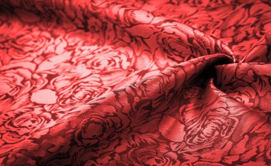 relief pattern, composite textiles, red silk fabric, with a floral pattern, unusually pleasant visual sensations: slippery, coolness, softness; beautiful appearance, unique luster;