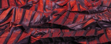 Doku. Geçmişi. şablon. Duvar kağıdı. Kırmızı çizgili siyah ipek kumaş, kırışık kumaş.