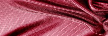 Arka plan dokusu, desen. Küçük kareli kırmızı ipek kumaş. Klasik bir görünüm, bunu tasarımcı koleksiyonunuza ekleyin. Kırmızı bir pist arıyorsan, nasıl gidileceğini öğrenebilirsin..