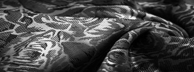 kabartma deseni, kompozit tekstil, siyah beyaz ipek kumaş, çiçek desenli, alışılmadık hoş görsel duyular: kayganlık, serinlik, yumuşaklık; güzel görünüş, eşsiz parlaklık
