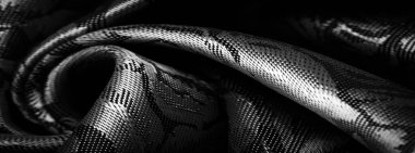 kabartma deseni, kompozit tekstil, siyah beyaz ipek kumaş, çiçek desenli, alışılmadık hoş görsel duyular: kayganlık, serinlik, yumuşaklık; güzel görünüş, eşsiz parlaklık