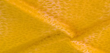 Doku, arkaplan, desen, beyaz sarı ipek kumaş tekstil. Özellikleri, daha esnek ve tasarlanması daha kolay olduğu için dokuma malzemesinden farklıdır..