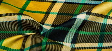 Doku, arkaplan, desen, kareli kumaş, sarı-yeşil-beyaz-mavi renkler, bu kumaşta İskoç motifleri, gayda sesleri ve güzel kokulu viski ile tasarladığınız tasarım.