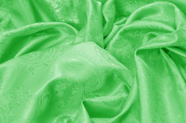 Doku arkaplanı Kumaş ipeği yeşili ince ve ışık, podyumdan esinlenerek tasarımınıza ekleyin. Pürüzsüz, berrak bir eli ve şeffaf bir opaklığı var. Astarın isteğe bağlı olmasını sağlıyor..