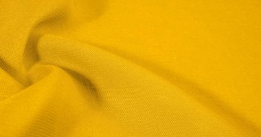 Arka plan dokusu, desen. Metalik pullu sarı kumaş. Bu güzel, hafif pullu kumaşın notaları, pullu aksanı ve güzel bir tasarımı var. Ayrıca güzel bir parıltısı var..