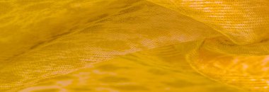 Doku, arkaplan, desen, beyaz sarı ipek kumaş tekstil. Özellikleri, daha esnek ve tasarlanması daha kolay olduğu için dokuma malzemesinden farklıdır..