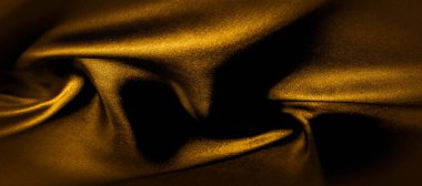 doku, arka plan, desen. altın sarısı ipek kumaş panoramik fotoğraf. Burası güneşli Carolina. Bu ince bir aydınlatma oluşturur pürüzsüz bir el. Lüks ipekten yapılmış, güzellik gibi.!