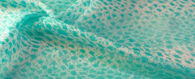 Doku, arkaplan, desen, yeşil beyaz ipek kumaş tekstil. Özellikleri dokuma malzemesinden farklıdır çünkü tasarımda daha esnek ve basittir..