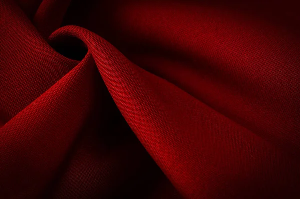 红色缎子是一种织物 通常有光滑的表面和迟钝的后背 缎子织物的特点是有四个或四个以上填充物或纬线 — 图库照片