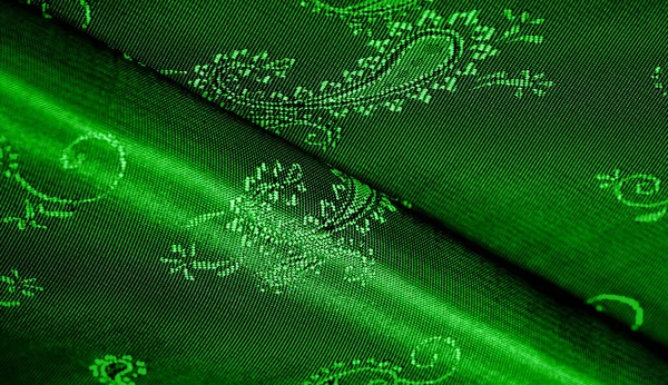 Texture, background, pattern Green silk chiffon fabric with a paisley print. This is a nice addition to any veneer. This is a beautiful floral design for your creativity.