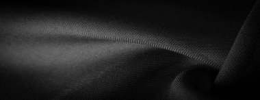 Doku, arkaplan, desen, saten siyah genellikle parlak bir yüzeye ve donuk bir sırta sahip, saten dokuma dört ya da daha fazla dolgu ipliği ile karakterize edilir.,