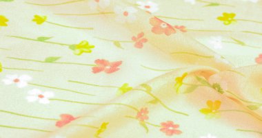 Doku arka planı, ipek kumaş, bej arka planda küçük çiçekler, ince dikiş. Kırmızı, bej renkli ton. Çiçek tasarımı