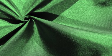 Arka plan dokusu, desen, derin zümrüt ipeği kumaşı, dekoratif tasarım..