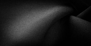 Doku, arkaplan, desen, saten siyah genellikle parlak bir yüzeye ve donuk bir sırta sahip, saten dokuma dört ya da daha fazla dolgu ipliği ile karakterize edilir.,