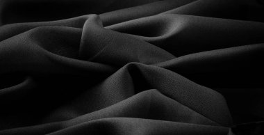 Doku, arkaplan, desen, saten siyah genellikle parlak bir yüzeye ve donuk bir sırta sahip, saten dokuma dört ya da daha fazla dolgu ipliği ile karakterize edilir.,