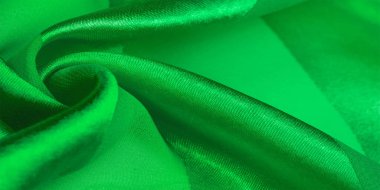 Doku, arkaplan, metalik parıltılı yeşil ipek çizgili kumaş. Eğer kötü bir ruh halin varsa, bu kumaş onu eşi görülmemiş yüksekliklere taşıyacaktır. Projeniz başarılı olacak..