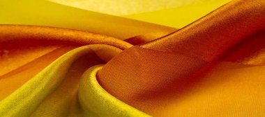 Doku, arkaplan, metalik parıltılı sarı ipek çizgili kumaş. Eğer kötü bir ruh halin varsa, bu kumaş onu eşi görülmemiş yüksekliklere taşıyacaktır. Projeniz başarılı olacak..