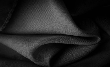 Doku, arkaplan, desen, saten siyah genellikle parlak bir yüzeye ve donuk bir sırta sahip, saten dokuma dört ya da daha fazla dolgu ipliği ile karakterize edilir.,