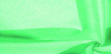 Doku, arka plan, desen, yeşil renk ipek kumaş. Bu ipek inanılmaz derecede zarif. Bu yapılan projeler uzun bir süre sürecek ve hala oldukça iyi durumda olacak.