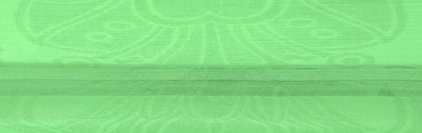 Texture, background, pattern, sensation, cambric - very thin translucent soft mercerized fabric, green magic mint