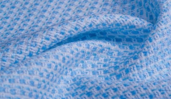 Texture, fabric, pattern. Large weave of blue and white threads, tightly woven fabric with a very simple over-under weave and very little sheen, which makes it nice and professional.