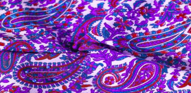 Arka plan dokusu, desen, desenli kumaş pamuk. Özgür Ruh için Kaffe Fassett tarafından tasarlanan bu büyük desenli paletin renk tonları, sıcak pembe, kobalt mavisi, fuşya ve mor ile yeşilin tonlarıdır..